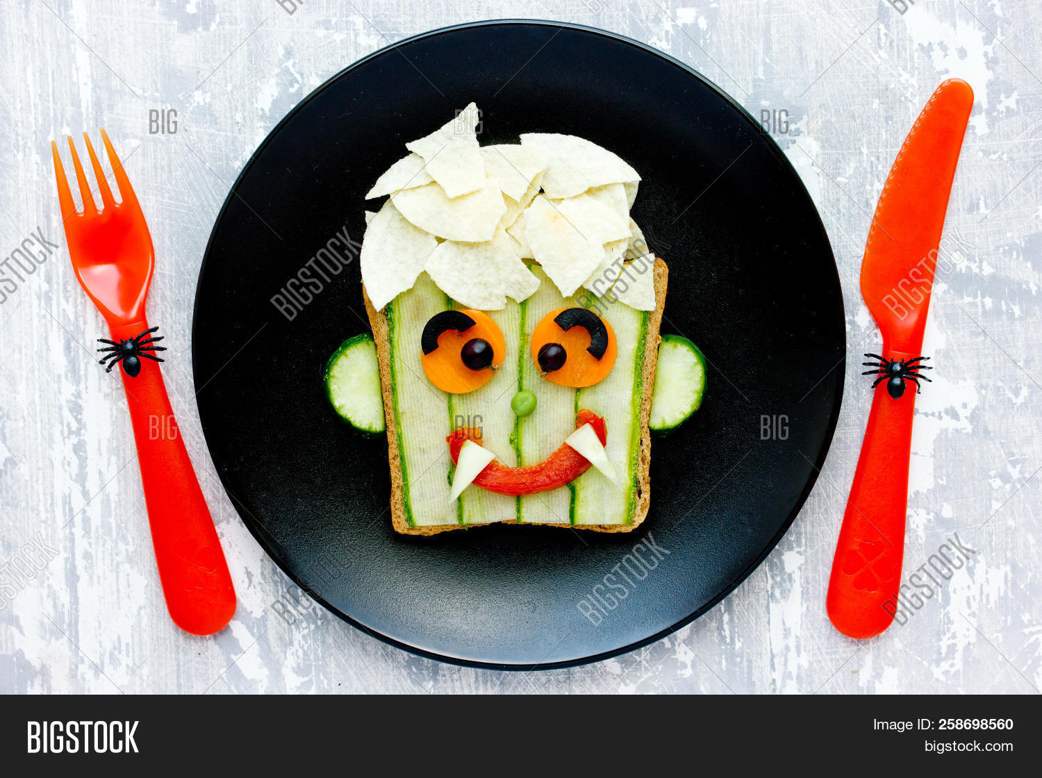 appetizer,art,background,breakfast,brunch,child,concept,creative,cucumber,cute,decorated,dinner,dish,evil,face,festive,food,fresh,fun,funny,gourmet,halloween,happy,healthy,holiday,idea,kid,lunch,man,meal,monster,party,plaster,plate,pumpkin,recipe,sandwich,scary,shaped,snack,spooky,traditional,treat,vampire,vegan,vegetable,vegetarian,werewolf,white,zombie