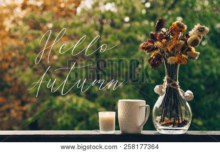 Hello Autumn. Cozy Autumn Still Life: Cup Of Hot Coffee With Autumn Bouquet Of Flowers On Vintage Wi