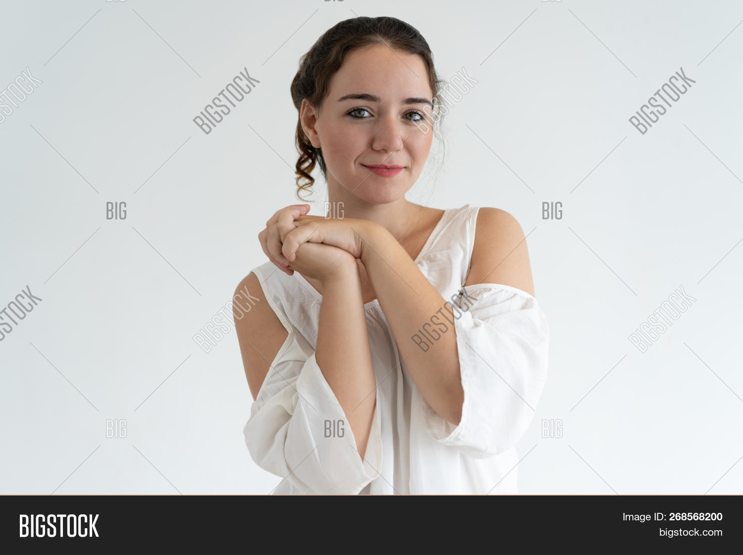 Caucasian,adoring,adult,attractive,beautiful,blouse,brown,camera,casual,clasped,concept,customer,cute,female,feminity,front,girl,hair,hand,horizontal,isolated,lady,liking,looking,love,lovely,one,person,portrait,posing,positive,pretty,relaxed,satisfied,smiling,standing,student,studio,teen,tenderness,together,twenty,wavy,white,woman,womanhood,worker,young