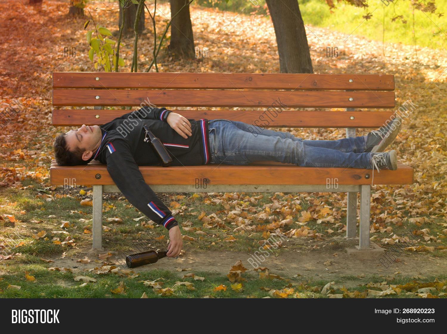 addiction,alcohol,alcoholism,among,and,autumn,beer,bench,bottle,crapulence,danger,day,death,dependence,dependency,deplorable,drink,drunk,drunkard,fall,female,girl,hand,health,help,her,holding,leaf,leave,lie,life,man,maternity,miserable,mothers,people,poor,problem,rest,sleeping,social,sos,therapy,woman,wood,wretched,young