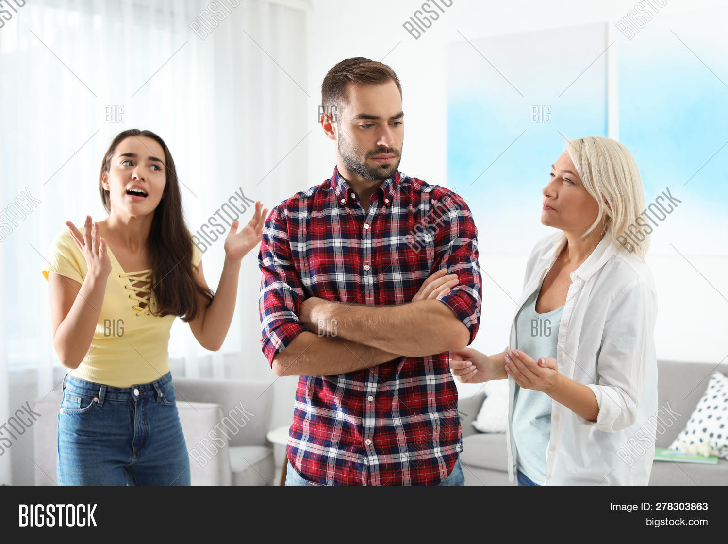 adult,angry,argument,arms,background,caucasian,conflict,couple,crossed,daughter,daughter-in-law,emotional,family,female,fight,generation,having,home,house,husband,indoors,lifestyle,living,male,man,mature,middle-aged,mother,mother-in-law,negative,parent,people,portrait,problem,quarrel,relationship,relative,room,sad,son,son-in-law,spouses,stress,struggle,trouble,unhappy,upset,wife,woman,young