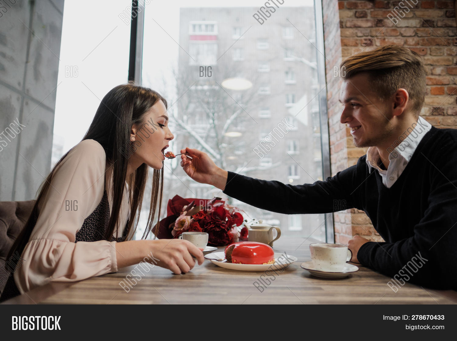 berry,boyfriend,cafe,cake,casual,coffee,couple,cup,date,dessert,drink,eating,family,feed,female,food,friends,hands,happiness,happy,heterosexual,husband,intimacy,joyful,leisure,lifestyle,light,love,lunch,male,man,meal,part,relationship,restaurant,romance,saucer,smile,smiling,spoon,sunlight,sunny,table,together,two,valentines,white,window,woman,wooden