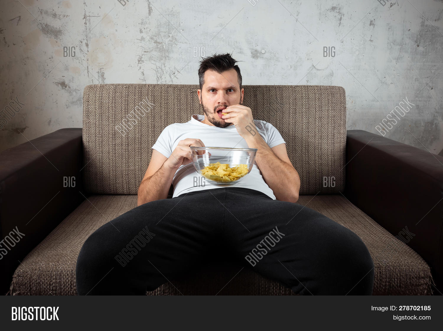 adult,bored,business,casual,caucasian,channel,chubby,comfortable,computer,couch,entertainment,exhausted,exhaustion,expression,fat,funny,home,laziness,lazy,leisure,lifestyle,living,lying,male,man,obese,obesity,one,overweight,people,person,potato,relax,relaxation,remote,rest,resting,room,sad,sedentary,sitting,sleepy,sofa,technology,television,tired,tv,watching,young