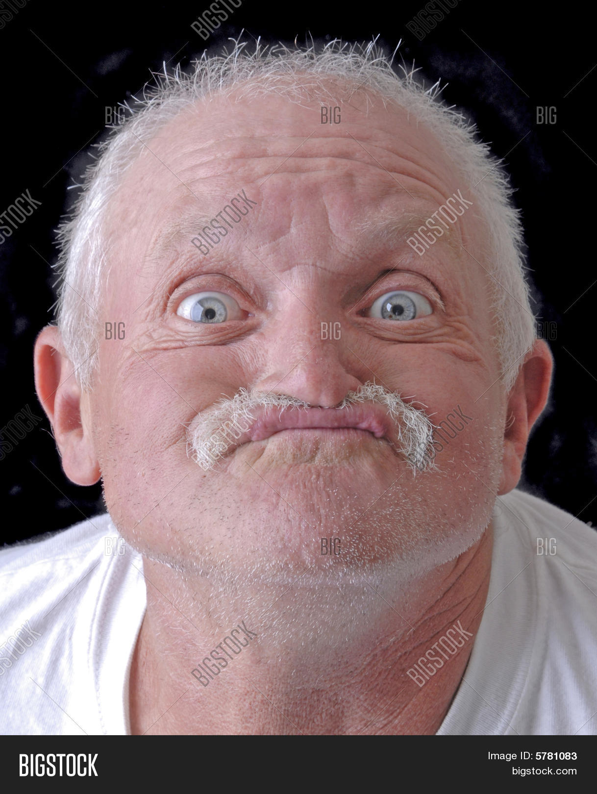 amazement,astonish,astonishment,asymmetric,bald,balding,blue,caucasian,crazy,elder,emotion,expression,expressive,eyes,face,freaky,fun,funny,funny face,gaze,gray,grimace,hair,human,humor,isolated,male,man,mental,mentally,mug,old,old man,open,pension,portrait,retired,retirement,senior,smile,surprise,toothless,ugly,unshaven,white,wide,wild,wonder,wrinkles