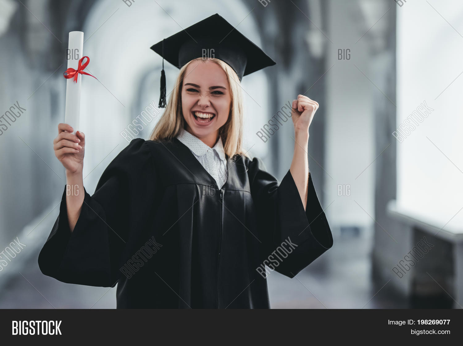 academic,achievement,adult,attractive,bachelor,beautiful,black,blonde,cap,celebration,ceremony,cheerful,college,concept,confident,day,degree,diploma,education,female,finish,fun,future,girl,graduate,graduated,graduation,hallway,hand,happiness,happy,hat,human,mantle,people,person,portrait,pretty,school,smile,smiling,standing,student,study,success,university,white,woman,young