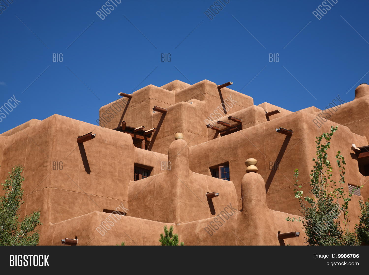 adobe,america,architecture,blue,brown,capital,city,fe,historic,mexico,new,nm,outdoors,pueblo,roof,santa,sky,small,southwest,spanish,style,texture,town,usa,wall,window