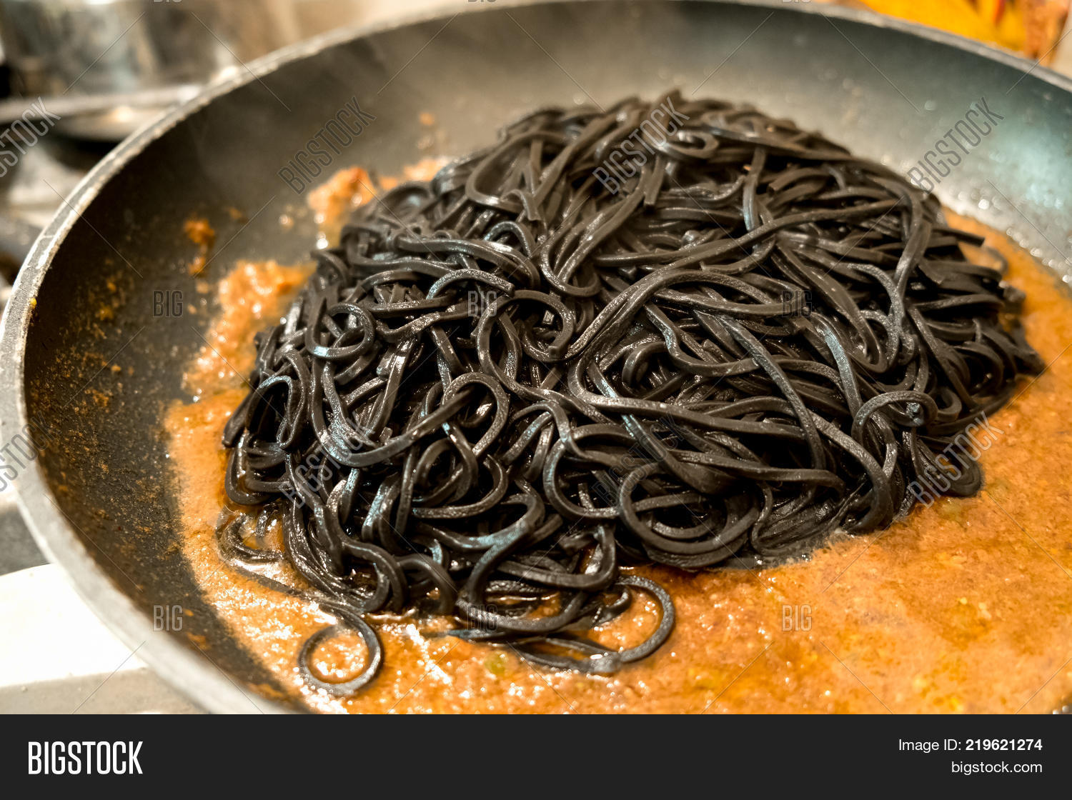 black,cephalopod,clam,closeup,coloured,cook,cookery,cooking,cuttlefish,detail,di,fettuccine,fish,focus,hot,ink,italian,linguine,mediterranean,menu,molise,nero,noodles,octopus,orange,pan,pasta,piedmont,preparing,recipe,regional,sauce,seafood,seasoning,sepia,seppia,smoking,specialities,squid,taglierini,tuna,typical