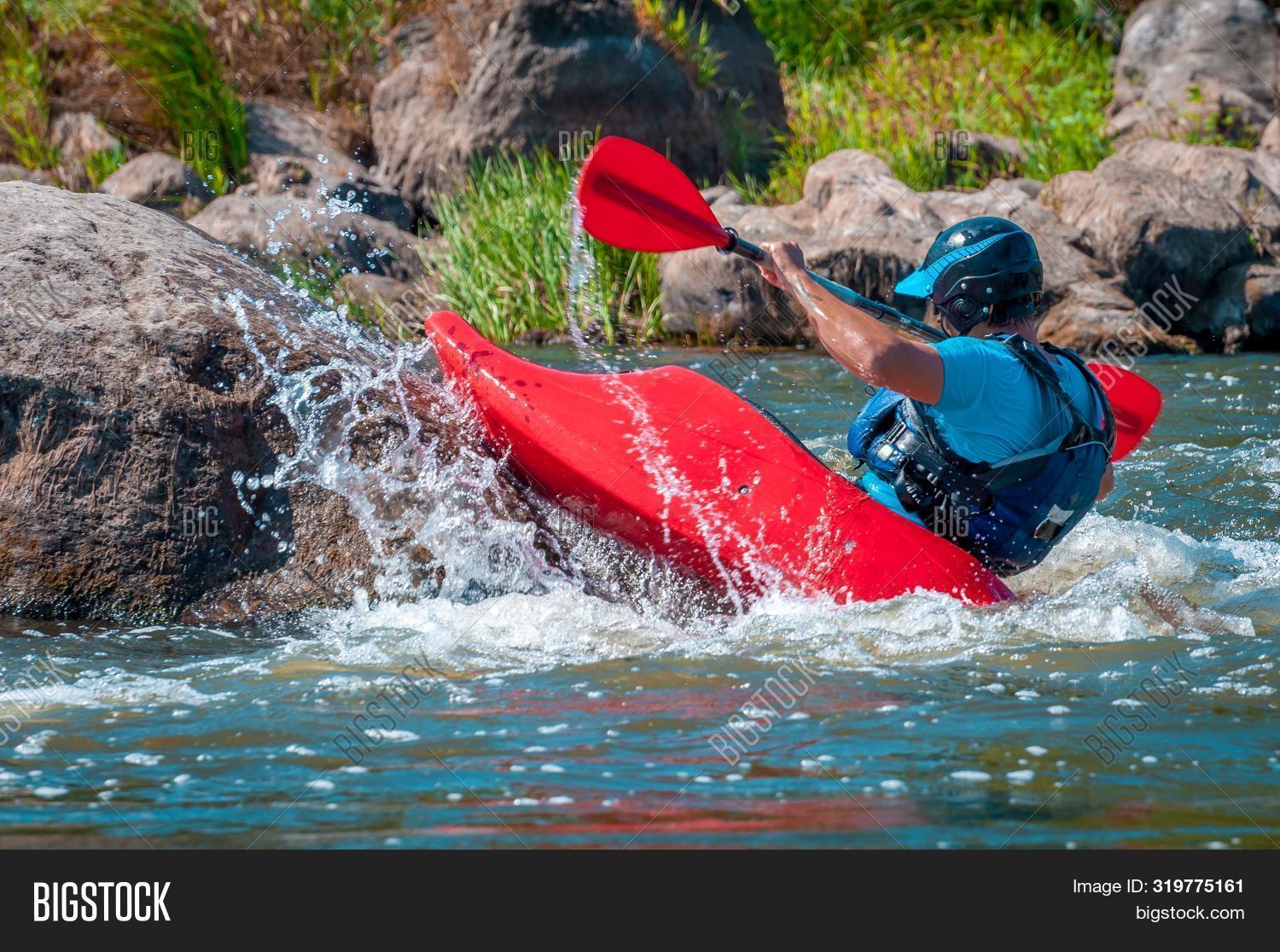 Eskimo,action,active,activity,adrenaline,adventure,boat,challenge,dagger,exercise,extreme,flow,foam,freestyle,helmet,kayak,kayaker,kayaking,leisure,man,oar,outdoors,paddle,people,playboat,playboating,playspot,rafting,rapid,recreation,risky,river,rodeo,roll,rowing,splash,sport,surfing,wanderlust,water,wave,white,whitewater