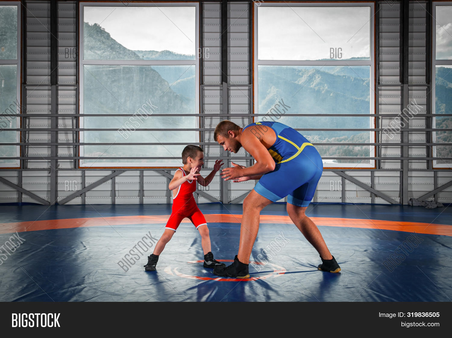 action,athlete,athletic,background,boy,child,circle,competition,elementary,fit,freestyle,greco,isolated,kid,male,man,mat,new,person,photography,portrait,red,roman,shot,singlet,sports,staggered,stance,strong,studio,tights,top,training,two,uniform,view,white,wrestle,wrestlers,wrestling,yellow,young,youth
