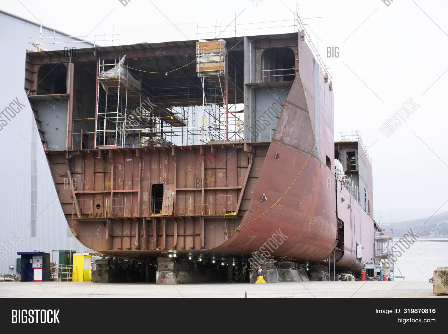 board,boat,building,business,cargo,coast,coastal,construction,crane,design,dock,energy,exterior,ferguson,gas,glasgow,govan,greenock,huge,hull,industrial,industry,inverclyde,large,marine,massive,metal,naval,navy,oil,outdoor,poles,port,scaffold,scaffolding,scotland,sea,shell,ship,shipbuilders,shipyard,sign,signage,structure,tradition,transport,transportation,uk,vessel,yard