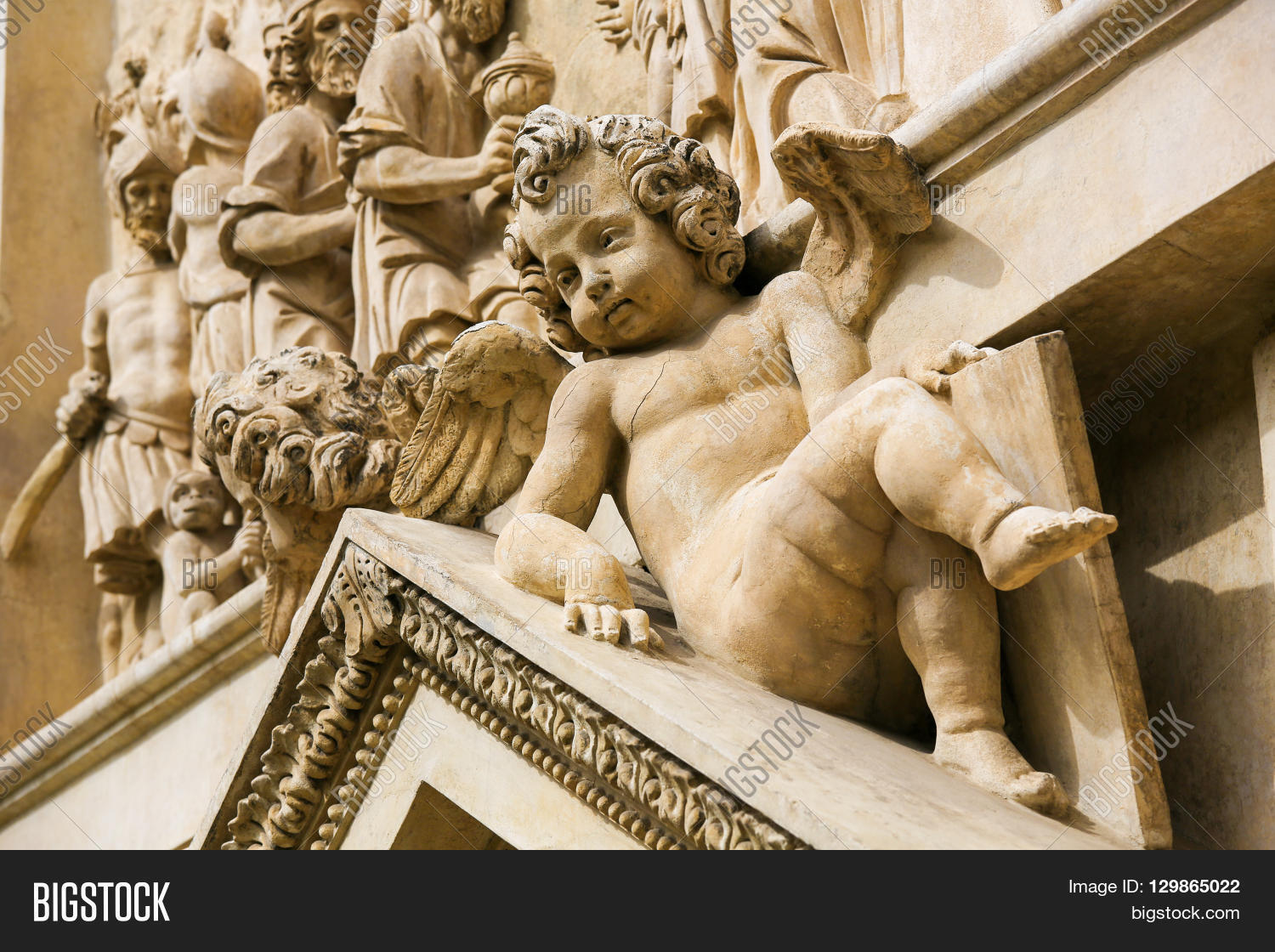 prague,loreta,statue,stucco,santa,casa:,baroque,sculpture,religion,religious,czech,church,cloister,famous,pilgrimage,destination,site,detail,art,artwork,work,hradcany,angel,stone,spiritual,cherub,naked,renaissance,putti,putto,male,chubby,cupid,cherubim,icon,iconography,symbol,symbolism
