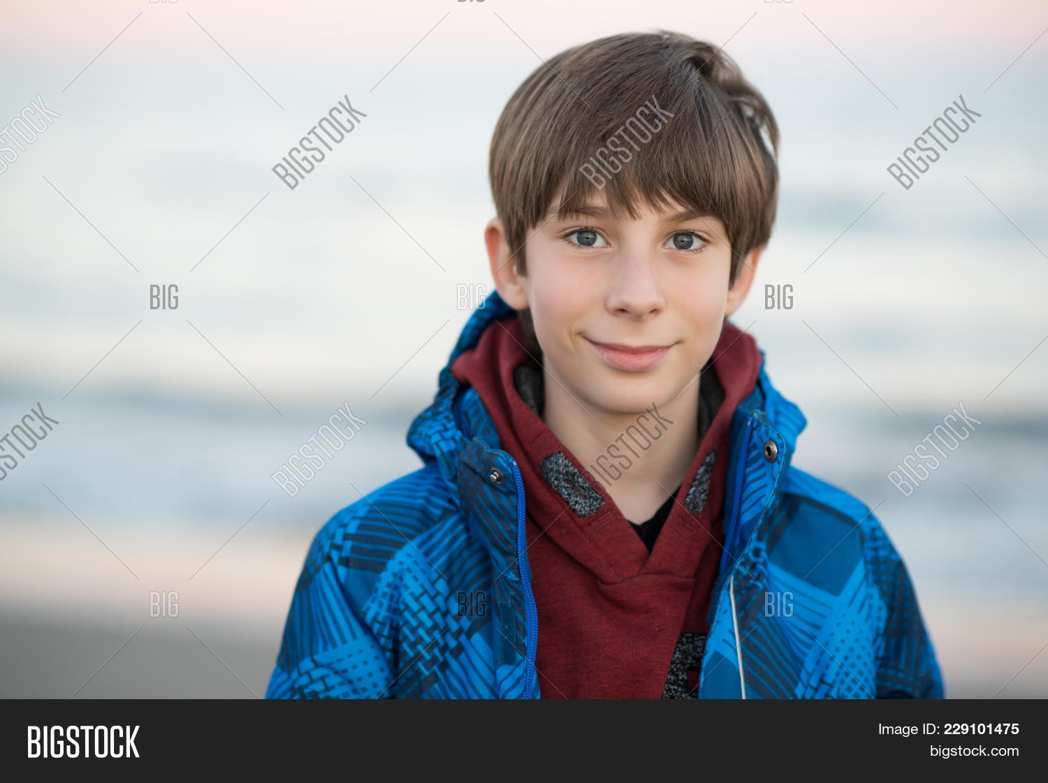 11-12 years old,attractive,beach,blue,boy,child,childhood,color,confident,cute,expressions,face,good mood,guy,handsome,happiness,happy,kid,looking at camera,mediterranean,mediterranean sea,nature,one person,outdoor,outside,people,plage,portrait,positive,sea,seaboard,seaside,shore,sky,smiling,teen,teenager,walking,water,winter,young,youth