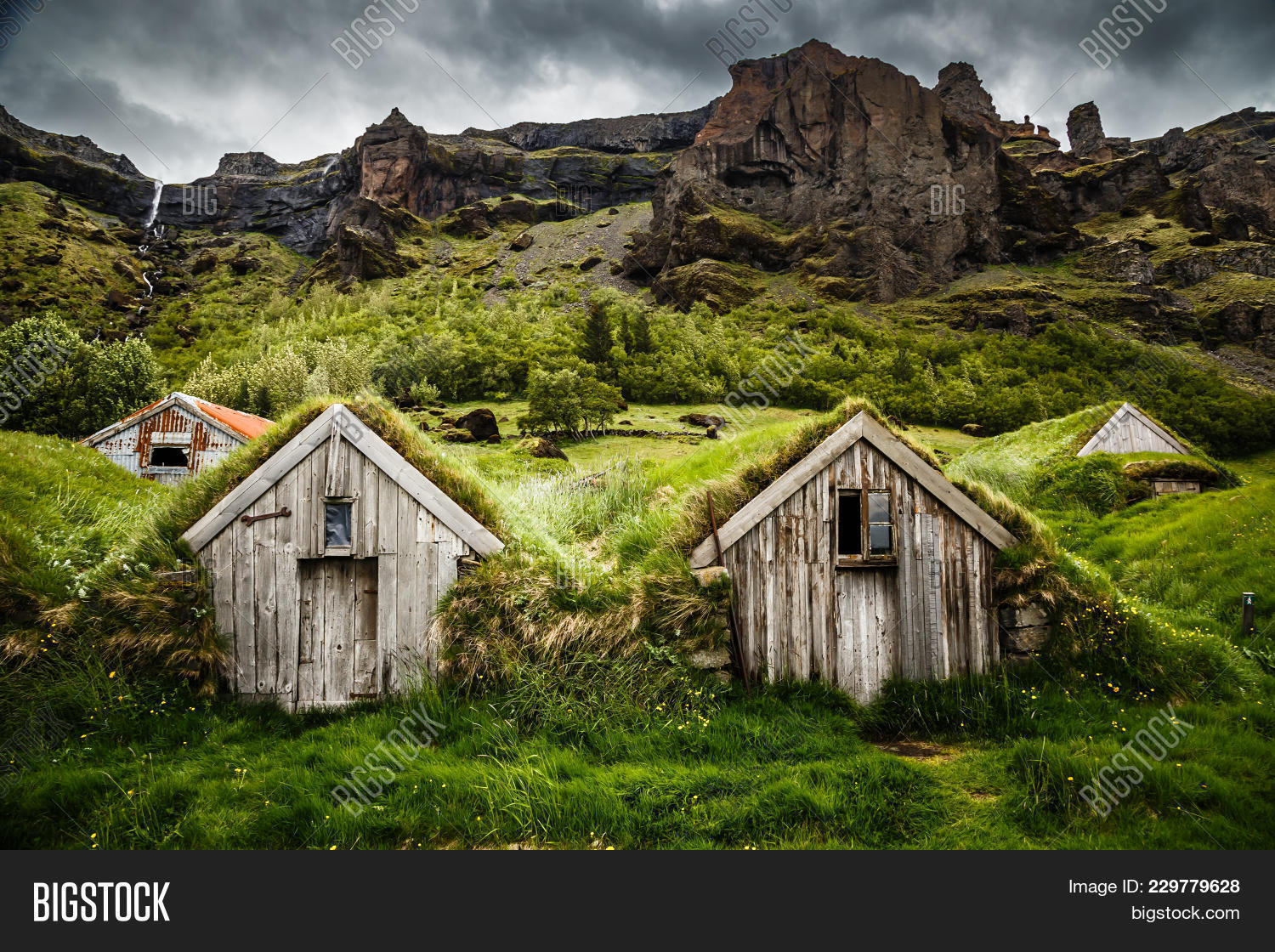 architecture,arctic,building,canyon,cliff,cottage,countryside,dwelling,ecofriendly,europe,exterior,farm,formation,grass,green,hidden,historic,home,house,hut,iceland,icelandic,landscape,living,moss,mossy,mountain,natural,nature,nordic,north,northern,old,outdoor,place,rock,roof,rural,scandinavia,scandinavian,scene,summer,terrain,traditional,travel,turf,typical,vacations,village
