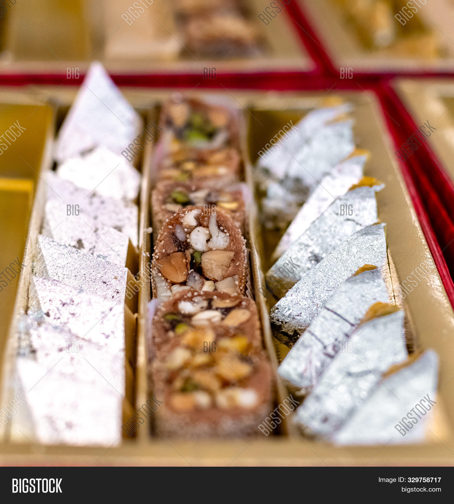asian,background,barfi,burfi,calories,celebration,closeup,cuisine,delicious,dessert,dish,diwali,festival,food,group,gulab,halva,halwa,india,indian,isolated,khoya,laddoo,laddu,ladoo,mawa,meal,mithai,mix,motichoor,pastry,peda,plate,presentation,silver,snack,soft,sugar,sugary,sweet,tasty,traditional,vegetarian
