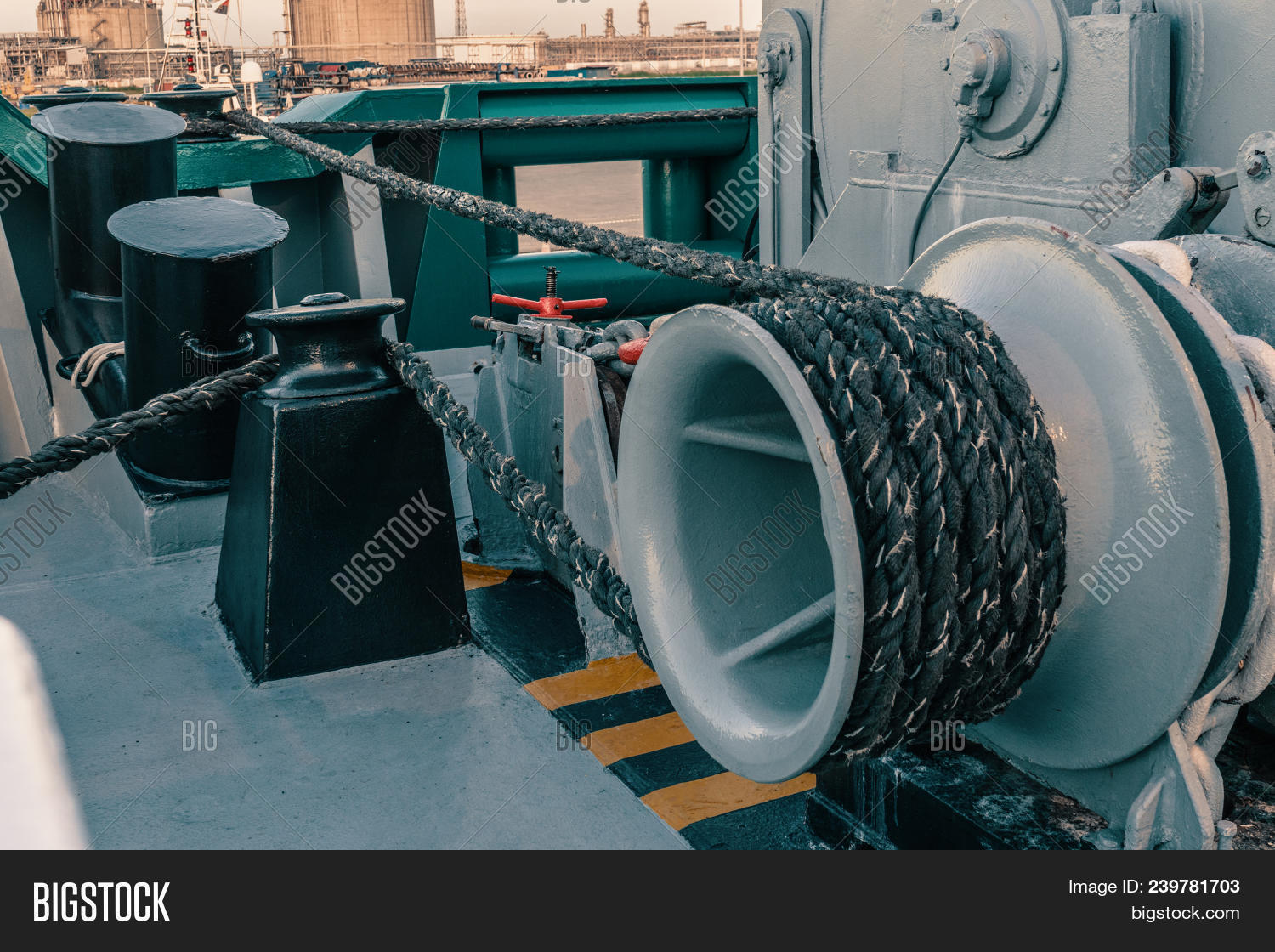 aft,anchor,area,background,bitt,bollard,brake,cable,construction,cord,crane,dangerous,deck,device,drum,electrical,engage,equipment,forecastle,forward,gear,grey,job,large,line,marine,metal,mooring,motor,order,poop,port,red,reel,rope,routine,rusty,safety,sea,ship,strong,vessel,winch,windlass,worn,yellow