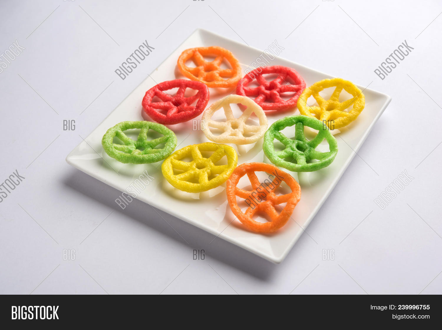 3d,aloo,asian,background,circular,colour,colourful,crackers,crispy,crunchy,details,dish,food,fried,fryums,indian,junk,macro,many,moody,multi,papad,pellets,potato,puffy,ring,roadside,school,served,shape,side,small,snacks,starters,tasty,texture,variety,veg,wheel,yellow,yummy