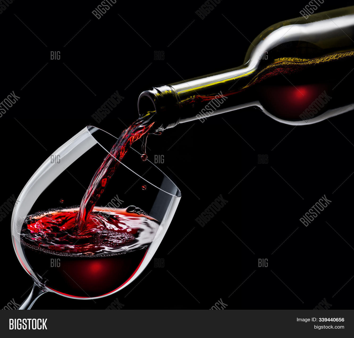 alcohol,bar,beverage,black,black background,bordeaux,bottle,cabernet,celebration,close up,culture,decanter,drink,drops,glass,gourmet,grapes,isolated,merlot,motion,open,opener,pour,production,red,restaurant,sauvignon,splash,splashing,vine,wave,wine,wine background,wine glass,wine market,wineglass,winery,winy