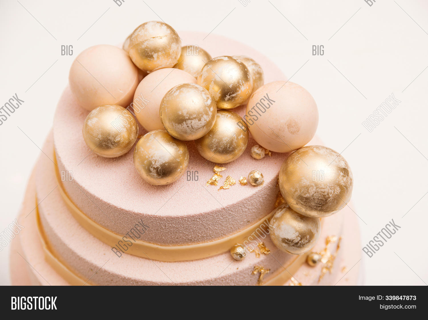 anniversary,background,bakery,baking,ball,birthday,cake,celebration,ceremony,chocolate,closeup,confectionery,day,decor,decorated,decoration,delicious,dessert,elegant,festive,food,foodie,fresh,glitter,gold,golden,gourmet,holiday,isolated,luxury,modern,mousse,pastry,poster,restaurant,romantic,style,sweet,table,tasty,tender,tier,tiered,trendy,vanilla,wedding,white