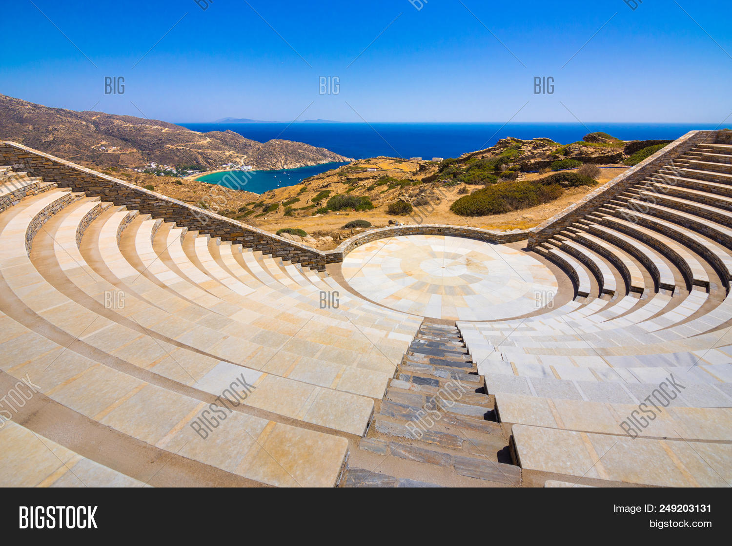 acoustic,aegean,amphitheater,amphitheatre,ancient,antique,architecture,beach,blue,building,circle,classic,clouds,culture,cyclades,design,europe,greece,greek,hill,history,island,mediterranean,milopotas,modern,mountain,mylopotas,nobody,old,one,outdoor,people,play,scenic,sea,seascape,seat,sky,steps,stone,structure,theater,theatre,tourism,travel,view,village