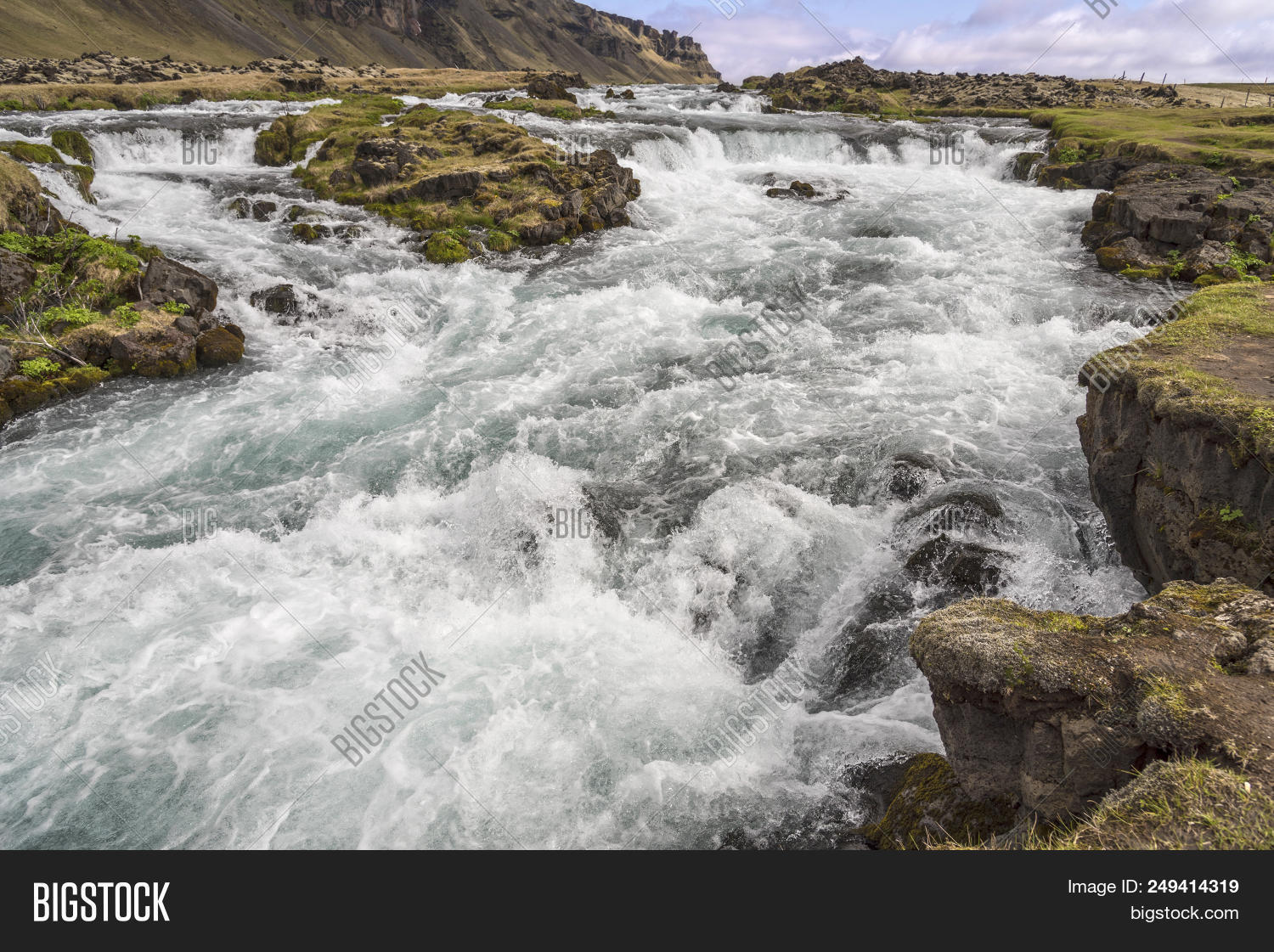 Fossalar,Fossálar,Iceland,Icelandic,Vatnajokull,arctic,attraction,blue,cascade,cliffs,europe,european,falls,landmark,landscape,majestic,nature,nordic,popular,powerful,rapids,ring,river,road,rocks,scandinavia,scenic,sky,spring,stream,summer,sunny,tourism,view,water,waterfall