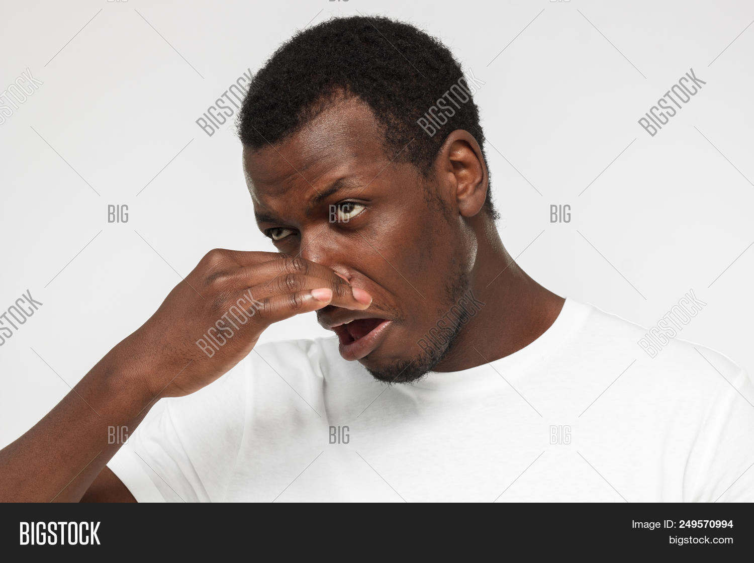 african,aroma,aversion,background,bad,black,breath,business,casual,close,customer,dirty,disgust,dislike,displeased,facialexpression,food,foul,frustrated,garbage,grease,gross,guy,hold,intolerable,isolated,loathing,male,nasty,nose,odor,offensive,one,people,poop,reaction,rotten,rubbish,rude,shocked,shoulders,skunk,smell,space,stench,strong,t-shirt,tshirt,unbearable,unpleasant