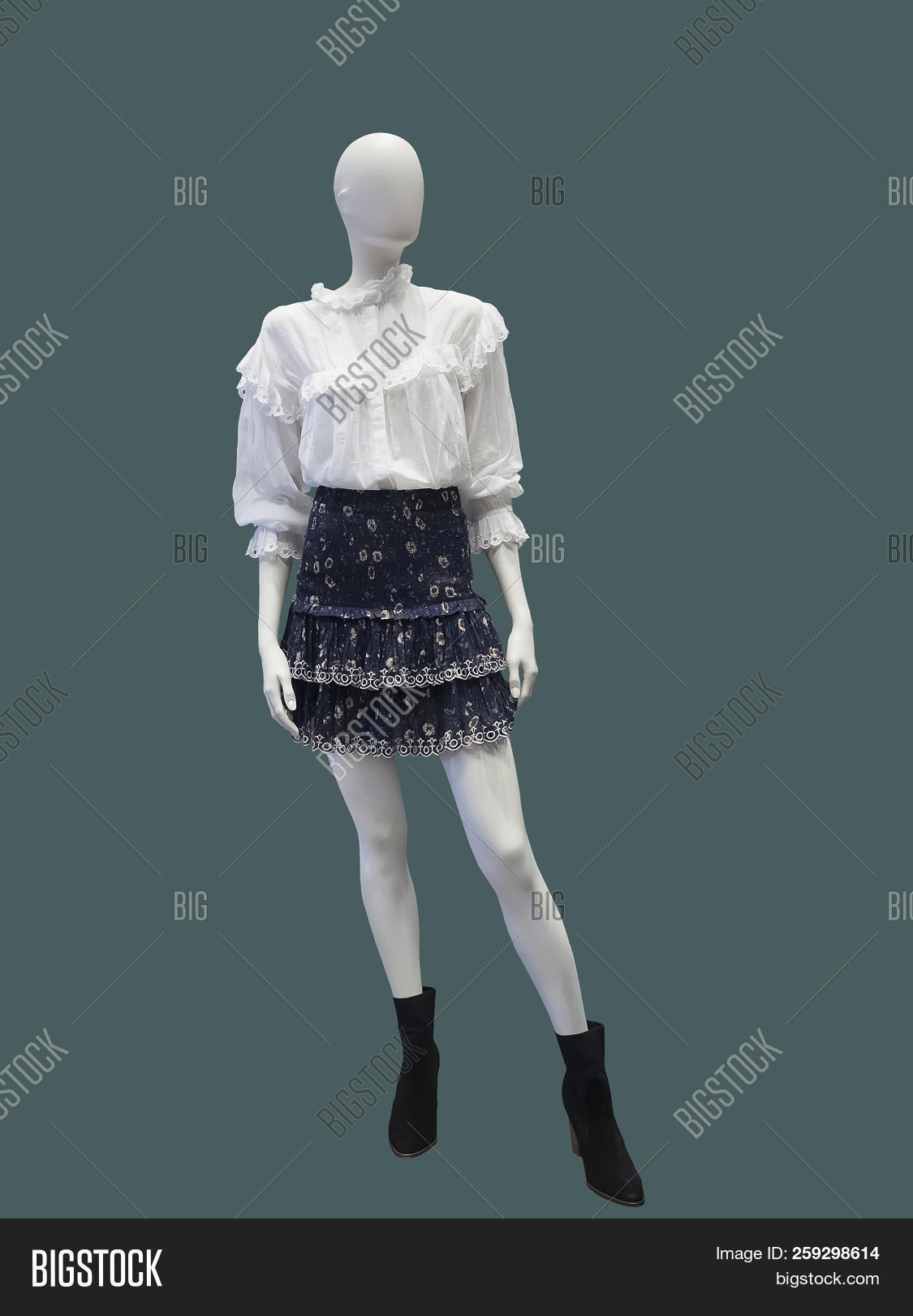 apparel,background,blouse,blue,casual,clothes,clothing,doll,dressed,dummy,fashion,fashionable,female,floral,flower,garment,isolated,mannequin,new,no,nobody,object,ornament,pattern,people,retail,shoes,single,skirt,wear,white,woman