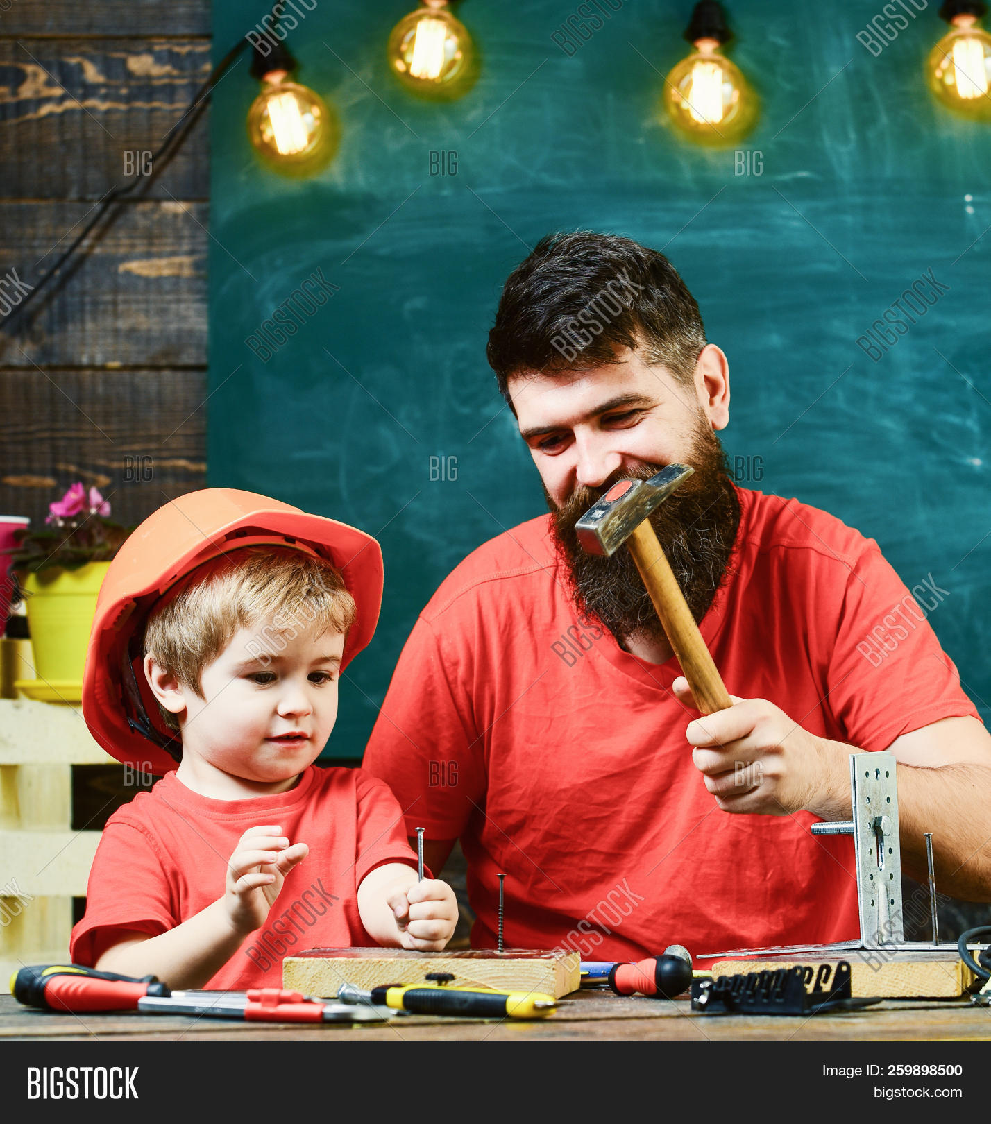 assistant,baby,background,beard,bearded,boy,builder,busy,by,caucasian,chalkboard,child,classroom,concept,craft,dad,day,face,family,father,fatherhood,handyman,hard,hat,helmet,help,helper,kid,kindergarten,learn,little,make,man,parent,play,protective,repair,repairer,school,small,son,study,teach,teacher,teamwork,toddler,tool,work,workshop