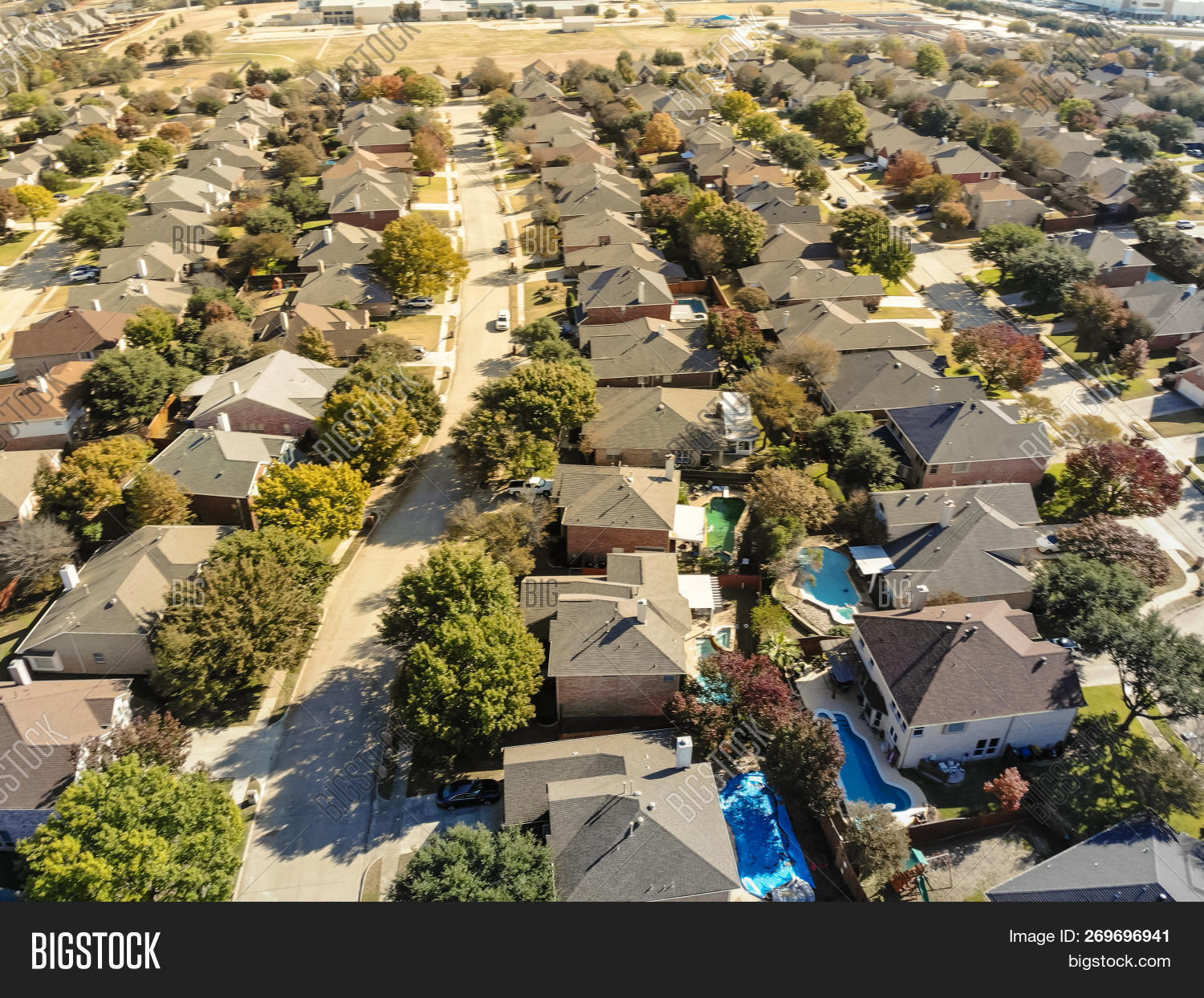 above,aerial,america,apartment,asphalt,autumn,brick,building,colorful,community,development,driveway,dwelling,entrance,estate,facade,fall,flower,foliage,garden,grass,home,house,housing,landscape,lawn,leaves,modern,mortgage,mound,neighborhood,pavement,property,real,residence,residential,road,seasonal,sidewalk,street,subdivision,suburban,texas,town,tree,upscale,usa,view,wealth,yard