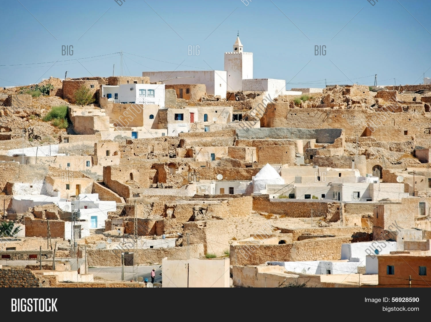 africa,architecture,ayed,bedouin,berber,blue,brown,building,clear,countryside,courtyard,culture,dar,day,desert,exterior,hill,horizontal,house,landscape,lifestyle,matmata,mosque,nature,nomad,old,people,residential,rock,ruins,rural,sahara,settlement,sky,stone,sunny,surrounding,tamezret,tourism,tourist,tower,traditional,travel,troglodyte,tunis,tunisia,unrecognizable,view,village,wall,white