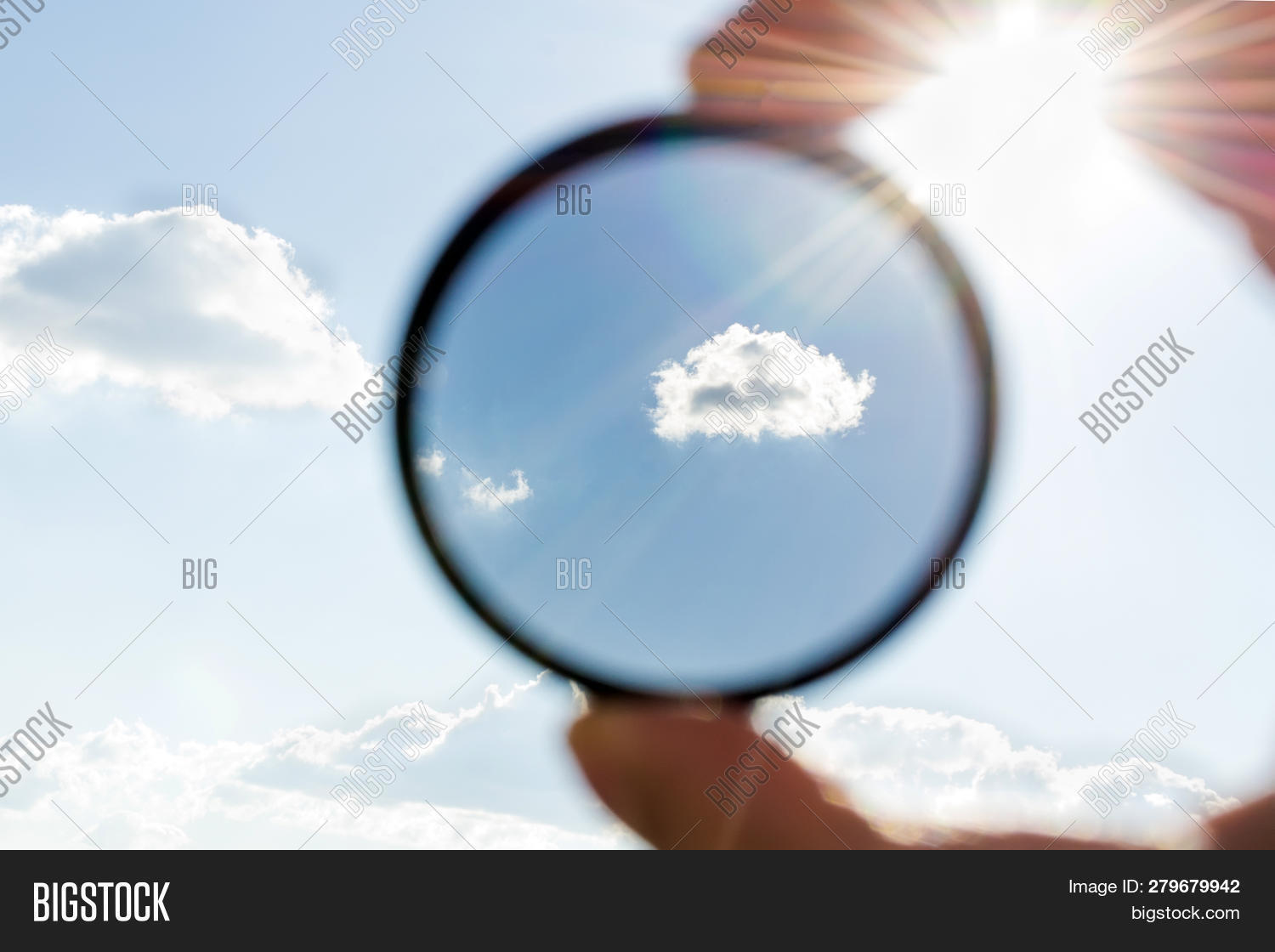 accessories,black,blue,business,camera,circle,circular,clarity,clear,cloud,concept,empty,equipment,filter,glass,hand,held,landscape,light,long,man,nature,nd,photo,photography,polaric,polarized,polarizer,polarizing,round,shape,sky,summer,sun,tool,travel,uv