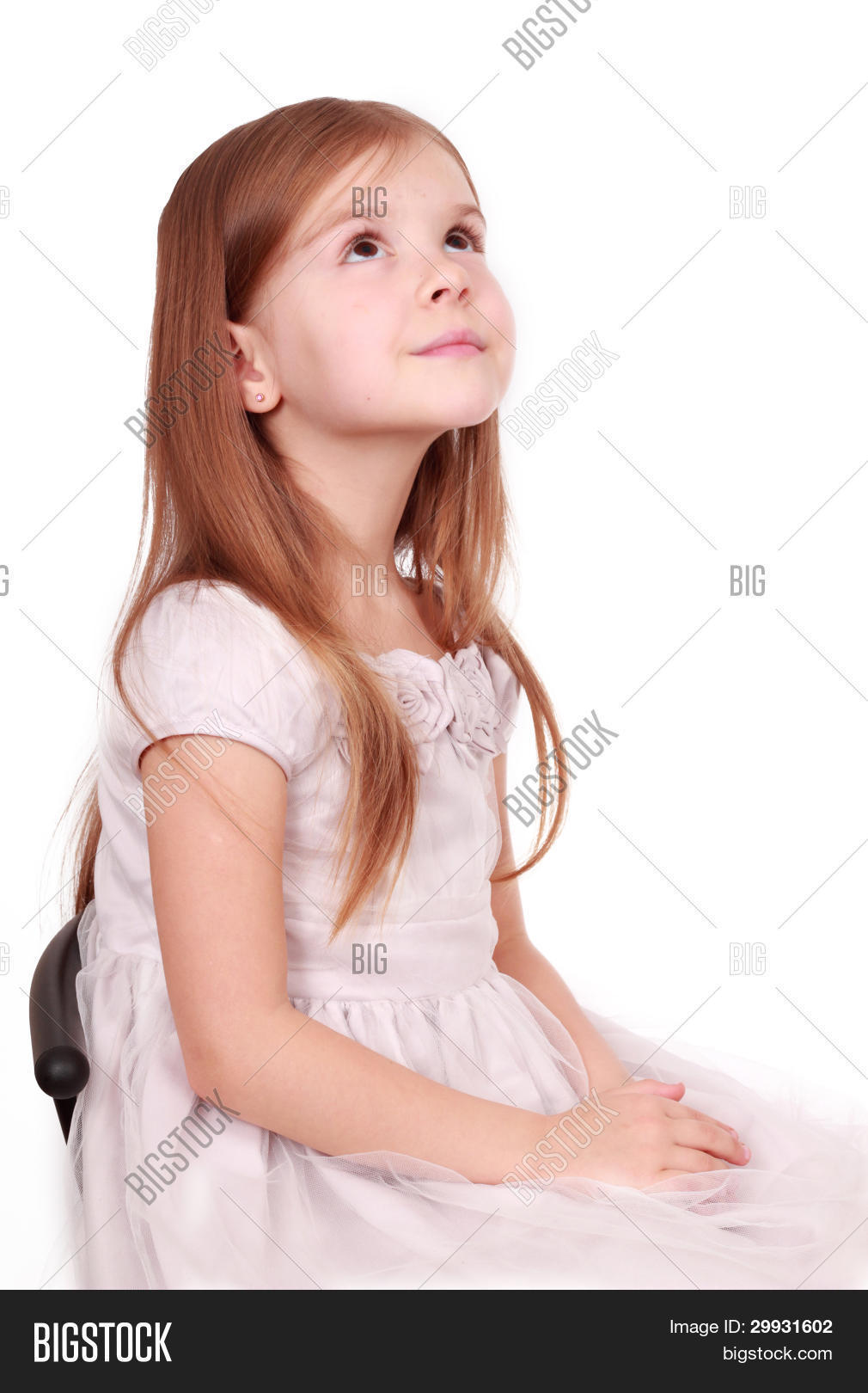 aspiration,background,caucasian,cheerful,child,closeup,copyspace,desire,face,female,fun,girl,happy,head,idea,imagination,ispiration,joy,joyful,lady,little,look,one,people,person,piggytail,portrait,positive,smile,studio,thinking,white,wish,young