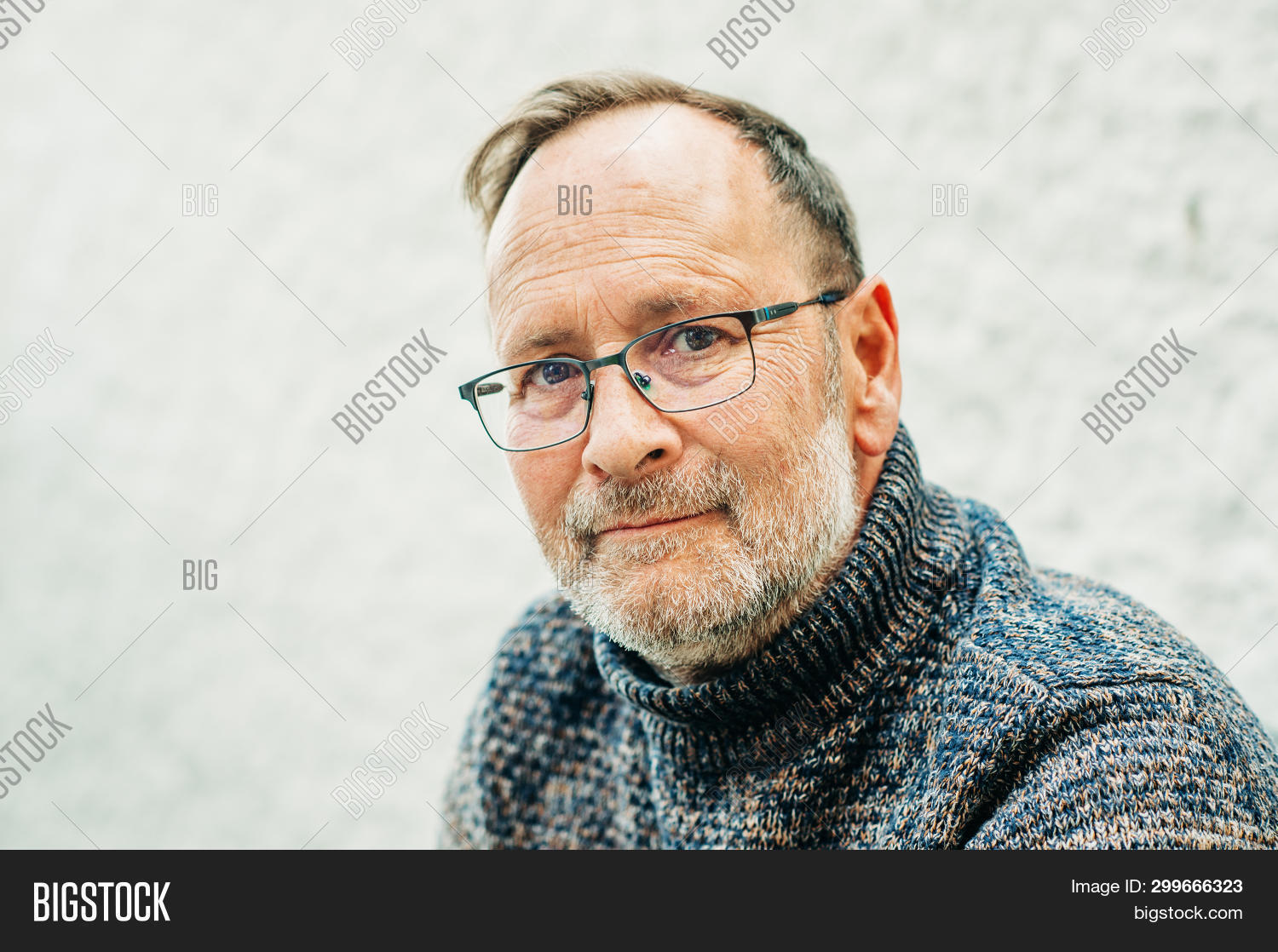 50-55,50s,adult,age,authentic,background,beard,candid,casual,caucasian,charming,confident,cool,copy,european,eyes,face,friendly,front,glasses,grey,guy,hair,handsome,happy,head,healthy,human,lifestyle,look,male,man,mature,middle,model,old,people,person,portrait,pullover,relaxed,retire,senior,shoulders,smile,space,tender,vision,year